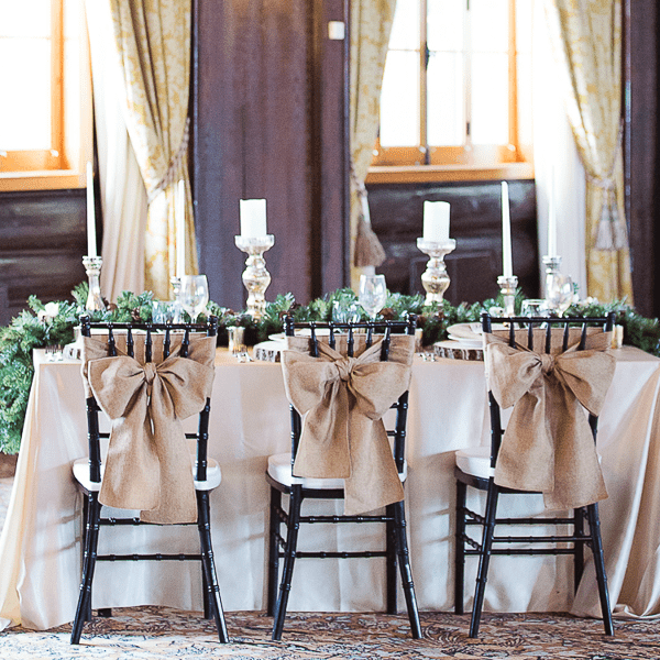 Chateau Montebello. A beautiful venue for and event. Our burlap sashes and champagne matte linens always shine